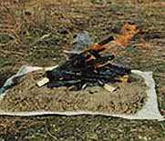 Use a Fire Blanket or Fire Pan to prevent scarring the ground with a campfire.